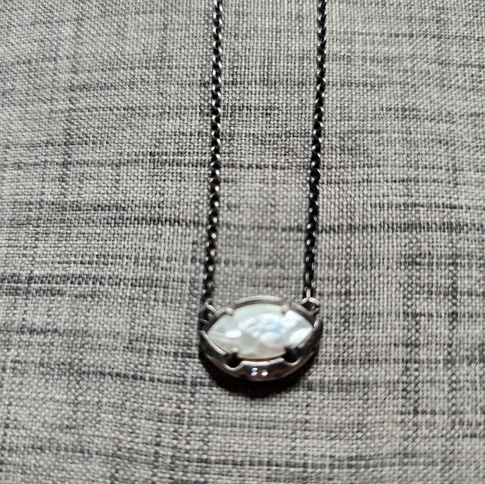 Kendra Scott bronze tone with mother of pearl setting